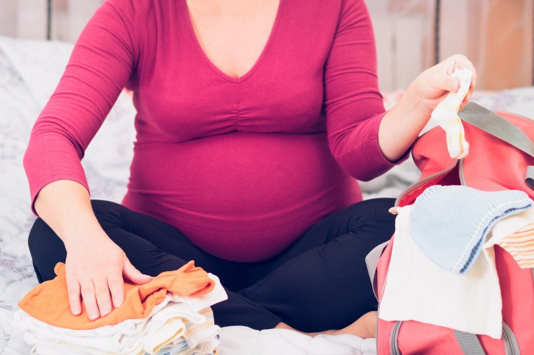 pregnant woman packing hospital bag