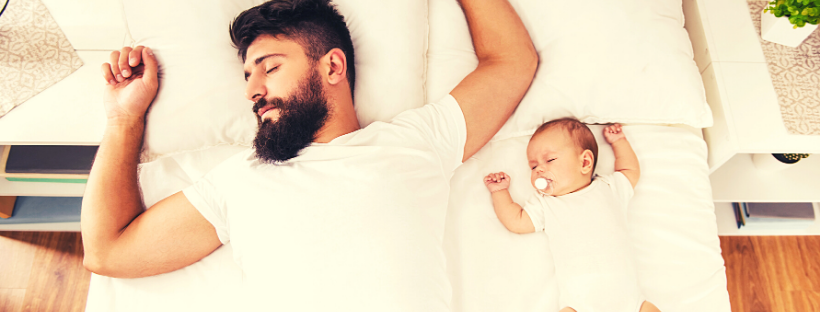 dad and baby sleeping